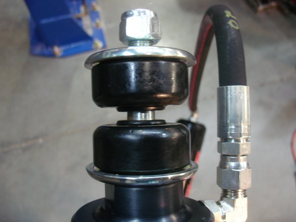 Install rear shocks with the reservoir facing the rear of the truck on both side.