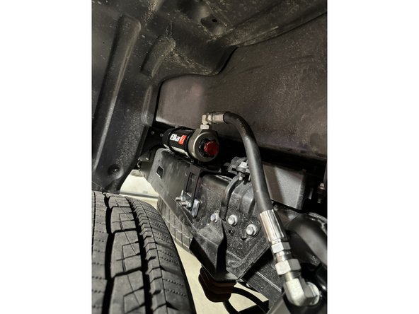 Install lower bolt first without tighten it now.