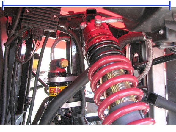 Install the reservoir with the banjo bolt (connected to the reservoir) facing towards the inside of the vehicule.  The reservoir must be attached to the frame using the provided rubber mounts and metal collars.  Do not over tighten the metal collars on the reservoir (torque to 6 lbs-in).  Make sure to route the hose according to the pictures.