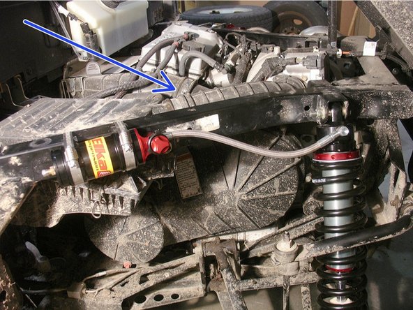 Remove the stock shocks. Refer to the vehicle’s owner manual if needed.