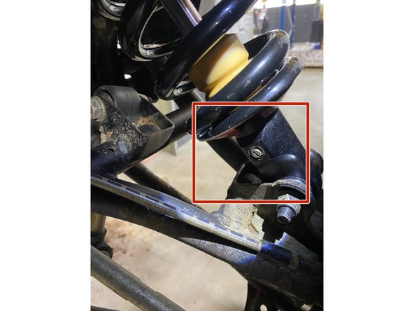On Stage 2, Stage 4 and Stage 5 models, the lower shock eyelets should be installed with the rebound adjuster (red square) oriented towards the back of the vehicle as shown by the Red square on the photo ( Right side shown ). If needed, you can turn the lower eyelet to orient properly.