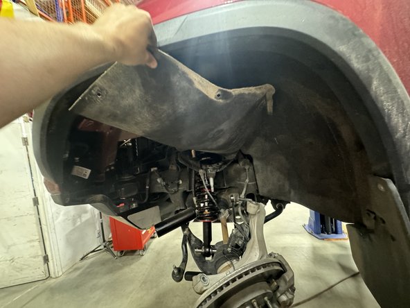 Left side : remove the fender to help reach the 3 upper bolts