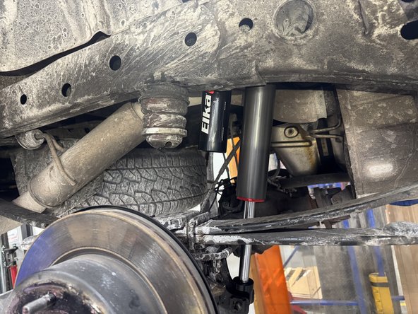 Install rear shocks with the reservoir facing the rear of the truck on both side