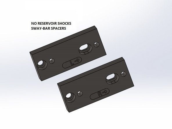 For Elka shocks without réservoir, use supplied rectangular spacers to move the sway bar forward. Use the spacer with an "L" on left side, with the arrow pointing forward the vehicle. Do the same with the "R" spacer on the right side.