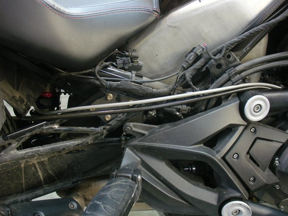 Route the hydraulic preload adjuster  hose the same way as step 5.