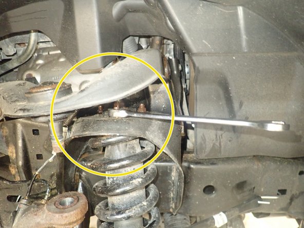 Remove the 3 upper nuts from OEM shocks.