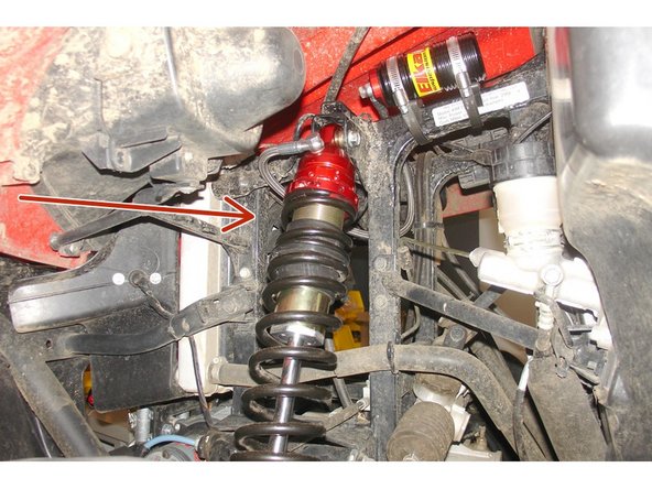 Install the Elka shock absorbers bolting the top mount first with the banjo bolt (connected to the shock head) facing towards the outside of the vehicule.  Orient the hose towards the front of the vehicule.
