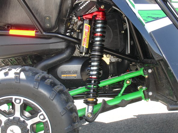 The Shraeder nitrogen valve must be at the top and facing towards the rear of the vehicle.