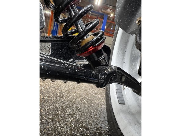 On Stage 2, Stage 4 and Stage 5 models, the lower shock eyelets should be installed with the rebound adjuster oriented towards the rear of the vehicle. If needed, you can turn the lower eyelet to orient properly.