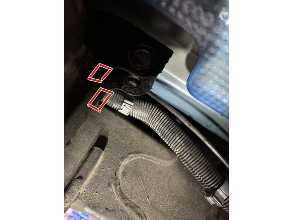 On the rear right side, grind the corner of the upper shock mount bracket to make sure their is no contact with the head of shock. Remove +/- 1/8 of material.