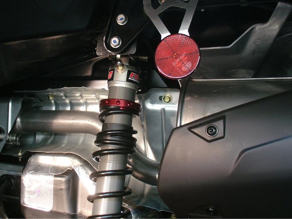 On Stage 1 and Stage 2, the left and the right shock are the same. Just install them with the shraeder nitrogen valve at the top of vehicle. (Left side shown).