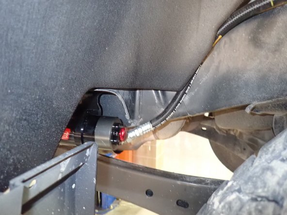 Apply some threads locker ,then torque clamp's bolts at 10 lb/ft.