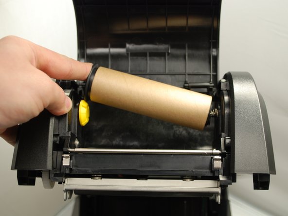 The rewind spindle goes on the TOP  spindle hub.