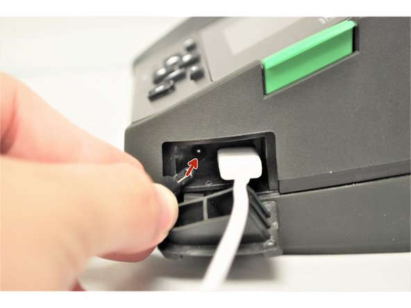 Connect the Printer Power Cord into the back of the printer in the power cord socket.