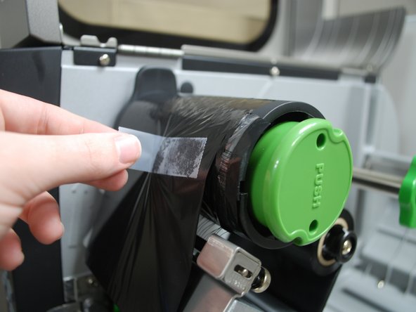 Get a piece of regular tape.