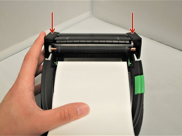 Close the lid, pressing down firmly on both sides to make sure the lid shuts all the way.