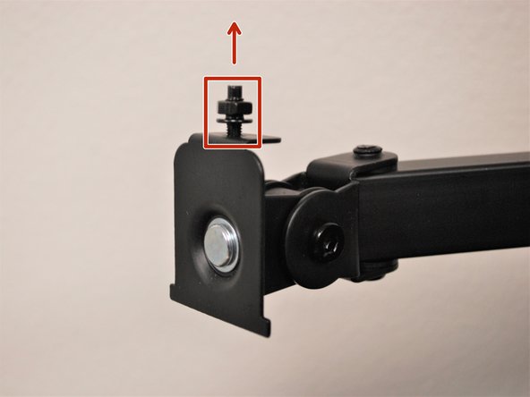 Ensure the bolt with the nut is facing up.