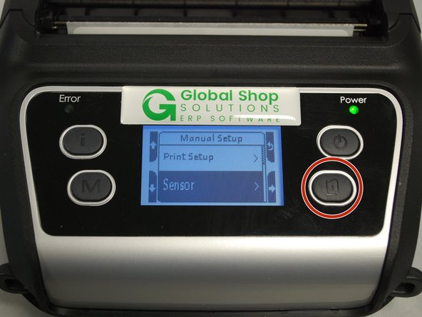 Press the Menu button to scroll down until the &quot;Sensor&quot; option is highlighted, then press the Feed button to open that menu.