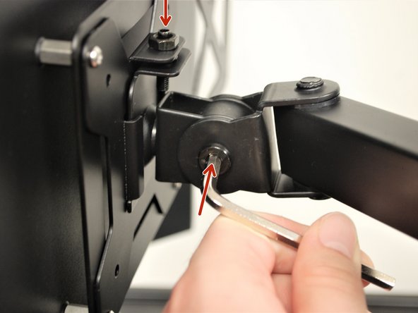 Reinstall the nut on the bolt to secure the monitor.