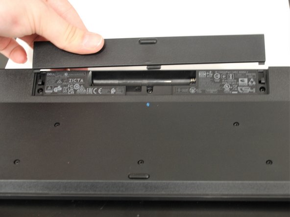 Insert the batteries into the slot for them.