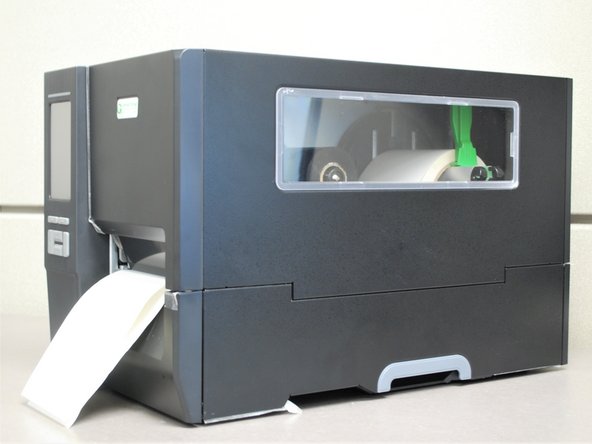 Close the cover on the printer.