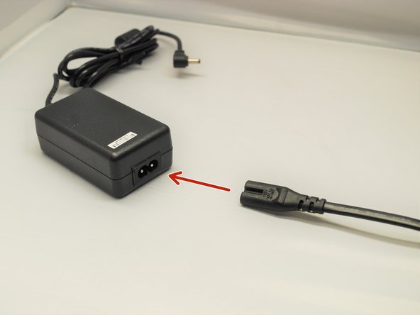 Connect the AC Adapter to the power cable.