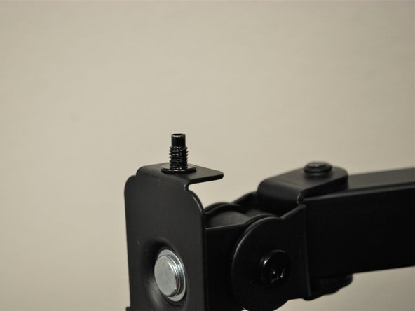 Remove the nut from the bolt.