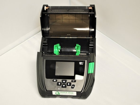 Remove the printer info sheet, if present, and make sure the media bay is clear.