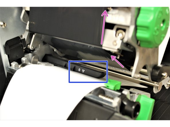 The path of the ribbon is shown by the pink arrows.