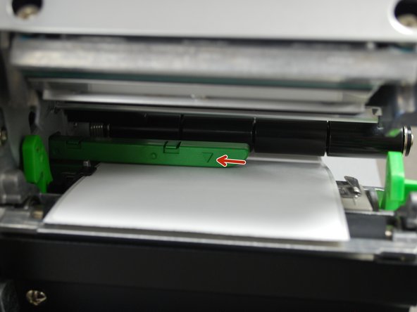 The arrow on the media sensor (3rd picture) should be approximately centered on the label. The arrow marking indicates the position of the sensor the printer uses to calibrates, so it's important to make sure it's in the right place.