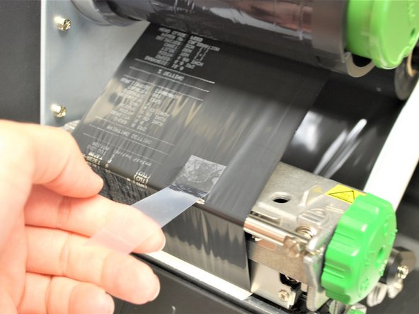 Get a piece of regular tape.