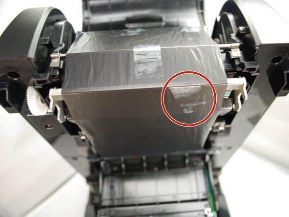 Get a piece of regular tape.