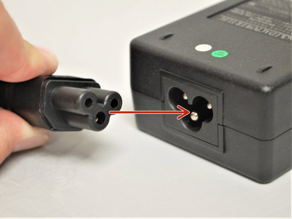 The Power Outlet Plug and the AC Adaptor Plug are two ends of the same cable.
