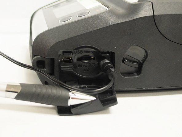 Connect the charging cable to power, and then plug it into the DC port of the right.