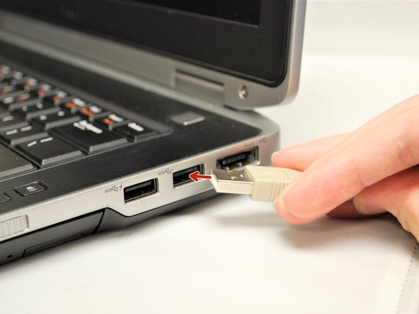 Plug the USB-A into your computer/laptop's USB port.