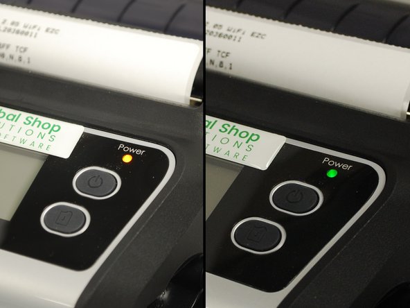 The power indicator LED should show an orange color while charging. Once fully charged, the color will change to green.