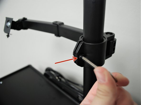 Use an Allen Key to tighten the bolt shown to tighten the grip the Swivel Arm has on the Support Beam.