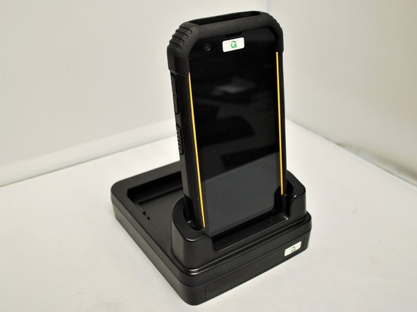 Connect the adapter to the Cradle, and plug the other end into an electrical outlet.