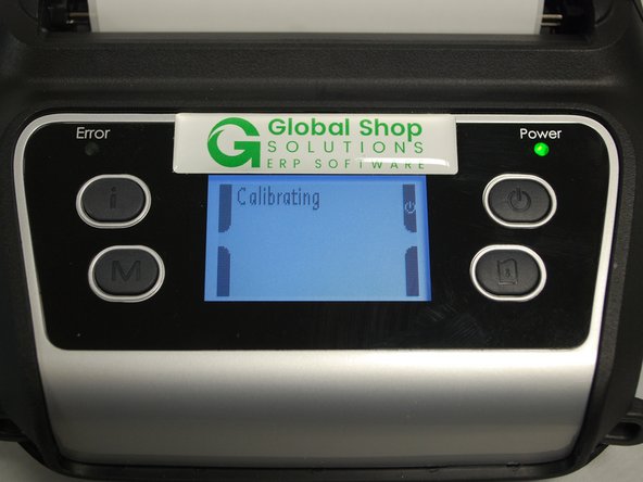 The printer should begin calibrating now. It will print a few blank labels as part of this process. Go to Step 6 to make sure calibration was successful.
