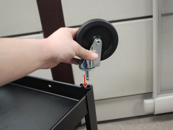 Insert the metal peg into the slot