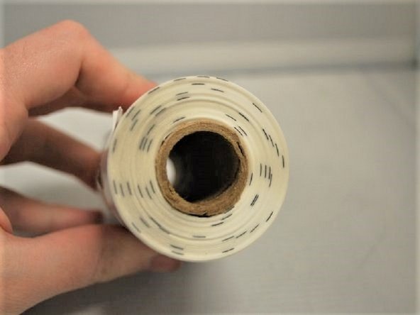 Check that the labels are direct thermal (DT) by lightly scratching the paper surface of one label. DT labels will show a light grey mark when scratched.