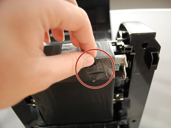 Get a piece of regular Scotch tape.