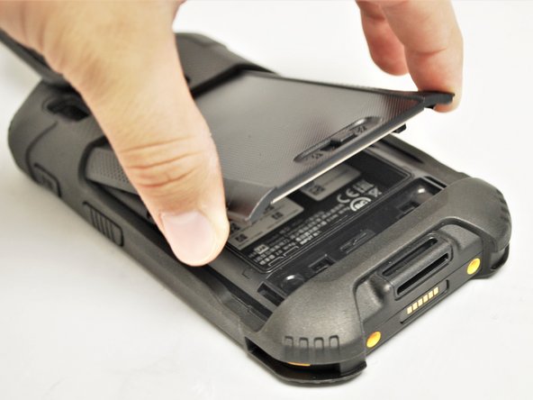 Put the battery in with the notches towards the front and the latch toward the bottom.