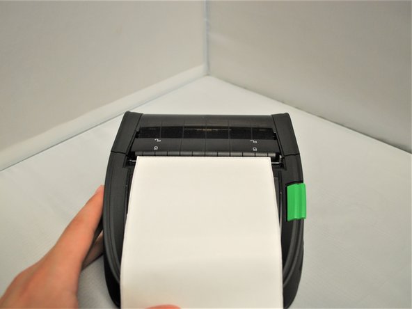 It should snap into place, and sit flush with the rest of the printer.