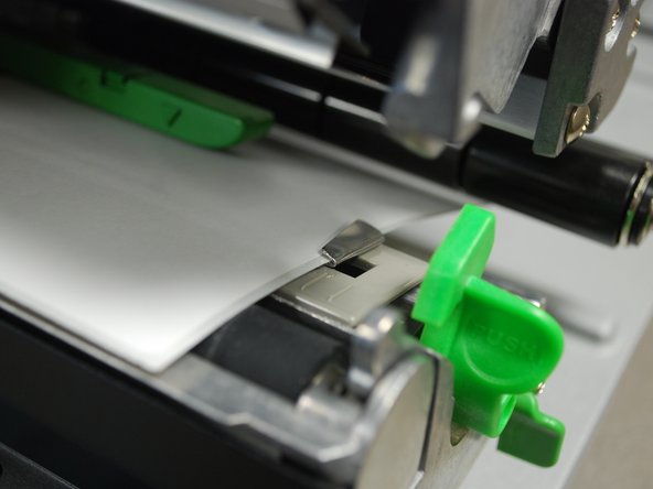 These clips keep the labels running straight, so it's important to make sure they're not so tight they stop the labels from coming out smoothly.