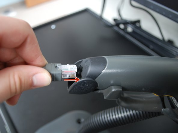 Plug the USB end of the USB adapter into the Mini PC