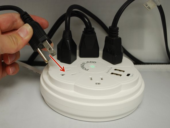 Once the Printer Power Cord is connected and the printer is off, connect the Power Outlet Cord into a power outlet.