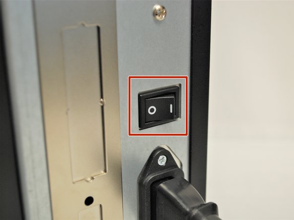 Make sure the printer is OFF  before continuing and plugging it into the wall.