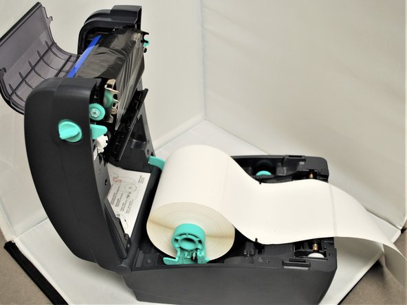 Check the path of the labels and ribbon. It should look like the first picture here.