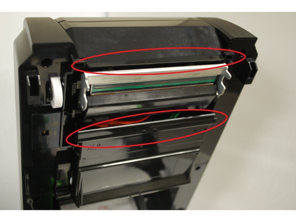 Gently lift the top cover until fully opened.